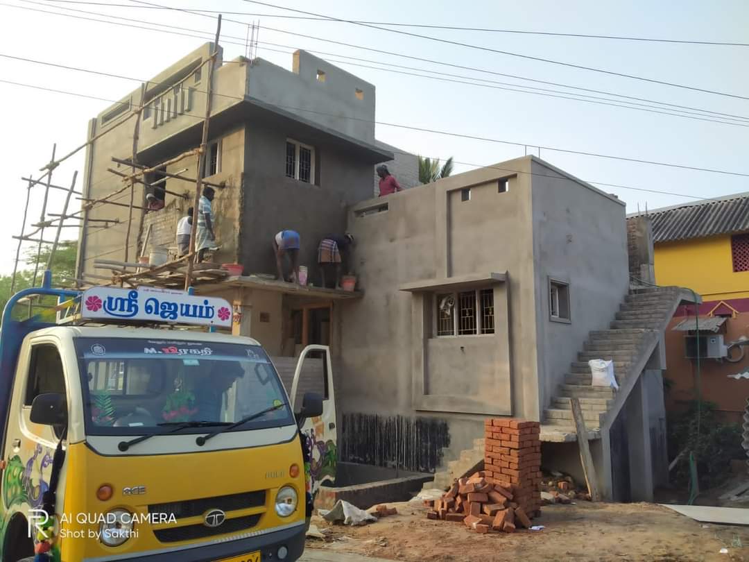 G+2 house under active construction with workers and scaffolding in Kumbakonam